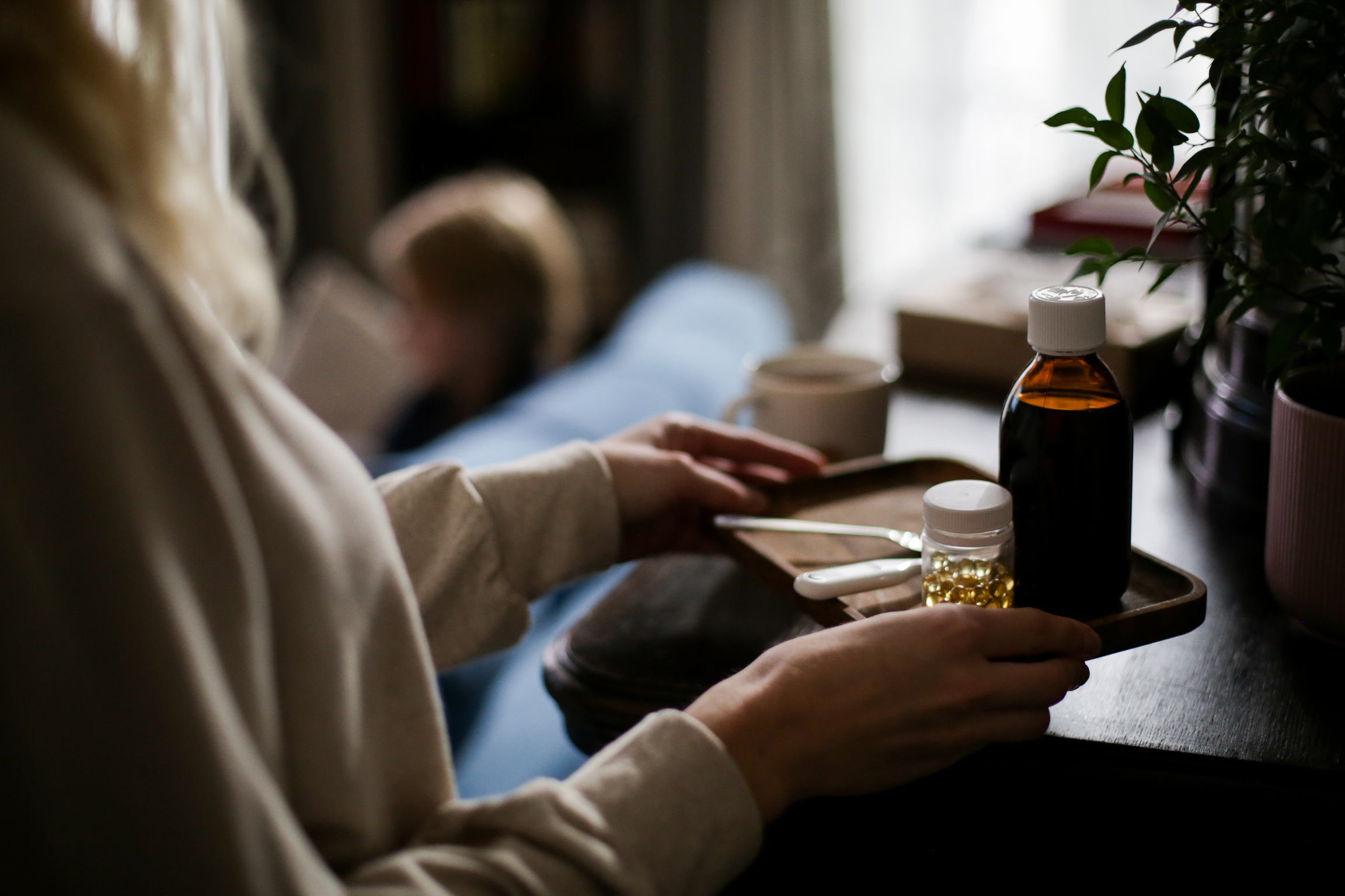 Person Holding a Wooden Tray